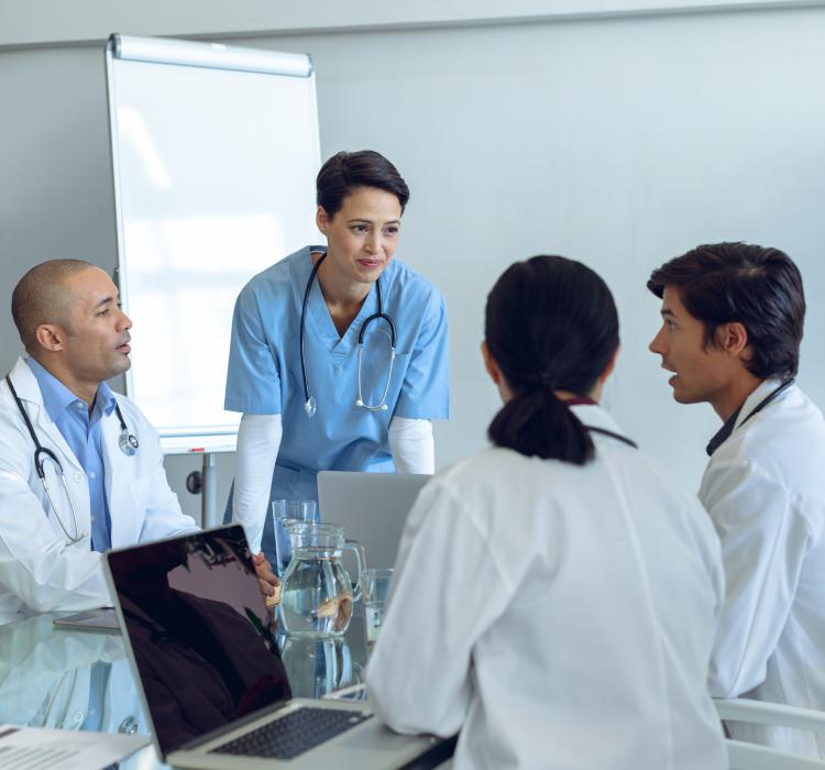 A doctor talking to the lady doctor