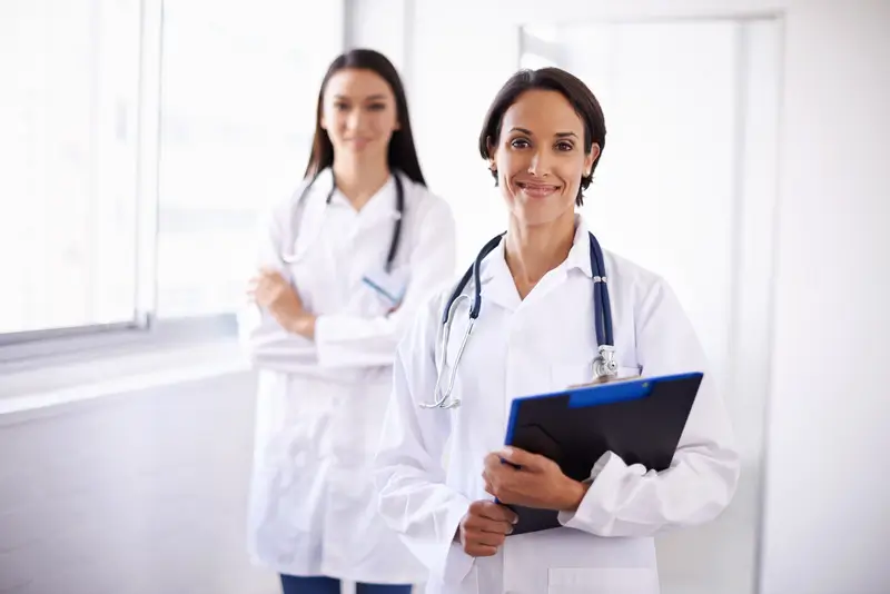 Two lady doctor talking