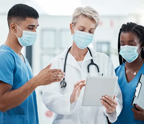 Group of doctor talking wear a mask