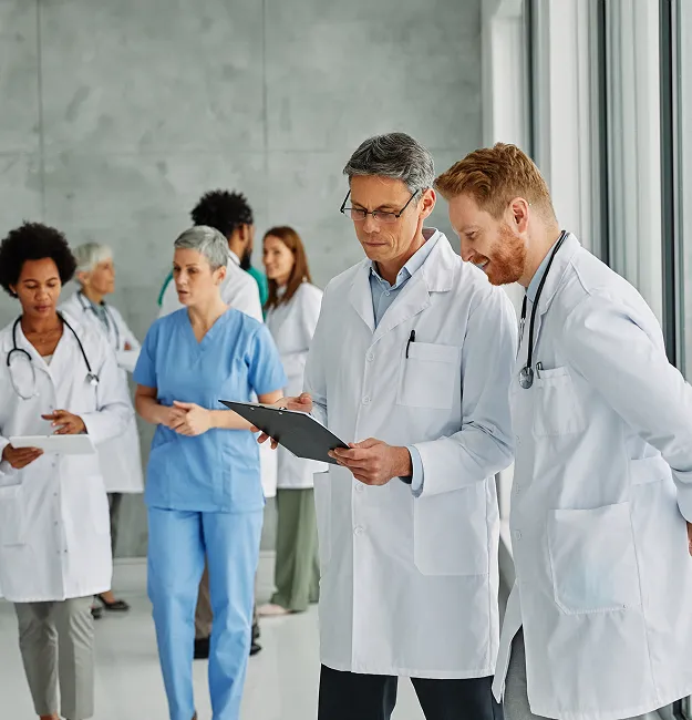 Two doctors talking on medical report